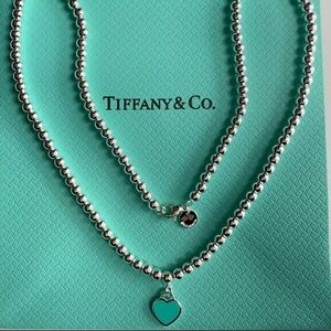 Tiffany & Co. Silver Necklace with Blue Heart Pendant